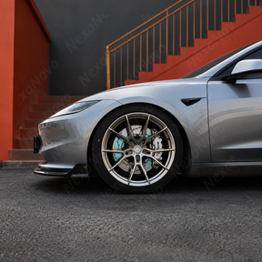 Detailed close-up of the mirror-finish gloss black clear coat on the NexaNovo 1-piece front lip splitter