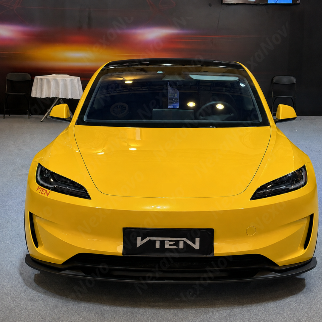Direct front-facing view highlighting the aggressive modular lower stance of the NexaNovo VTEN front lip on the redesigned Model 3