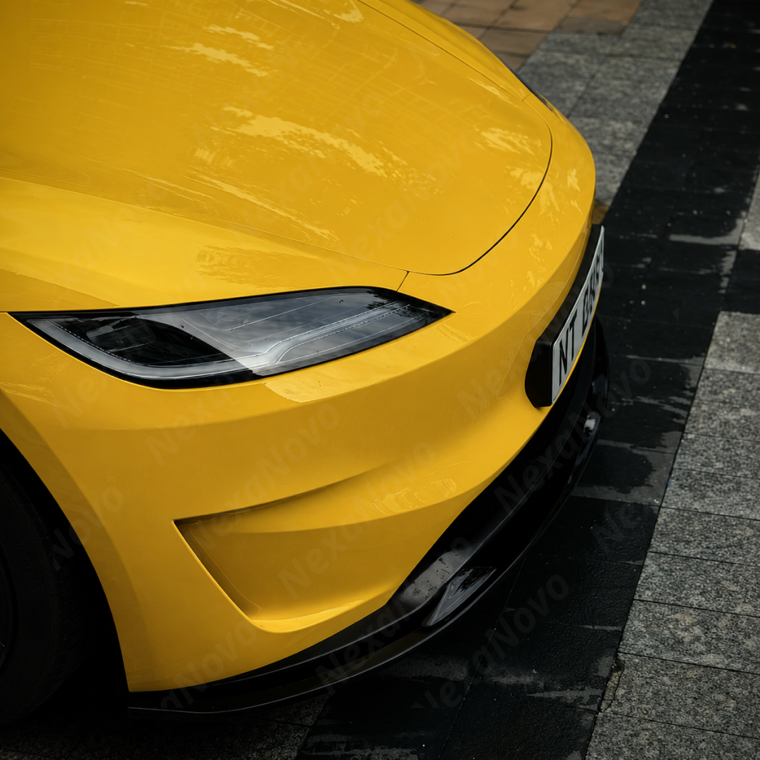 Detailed close-up of the mirror-finish gloss black clear coat on the NexaNovo 3-piece front lip splitter