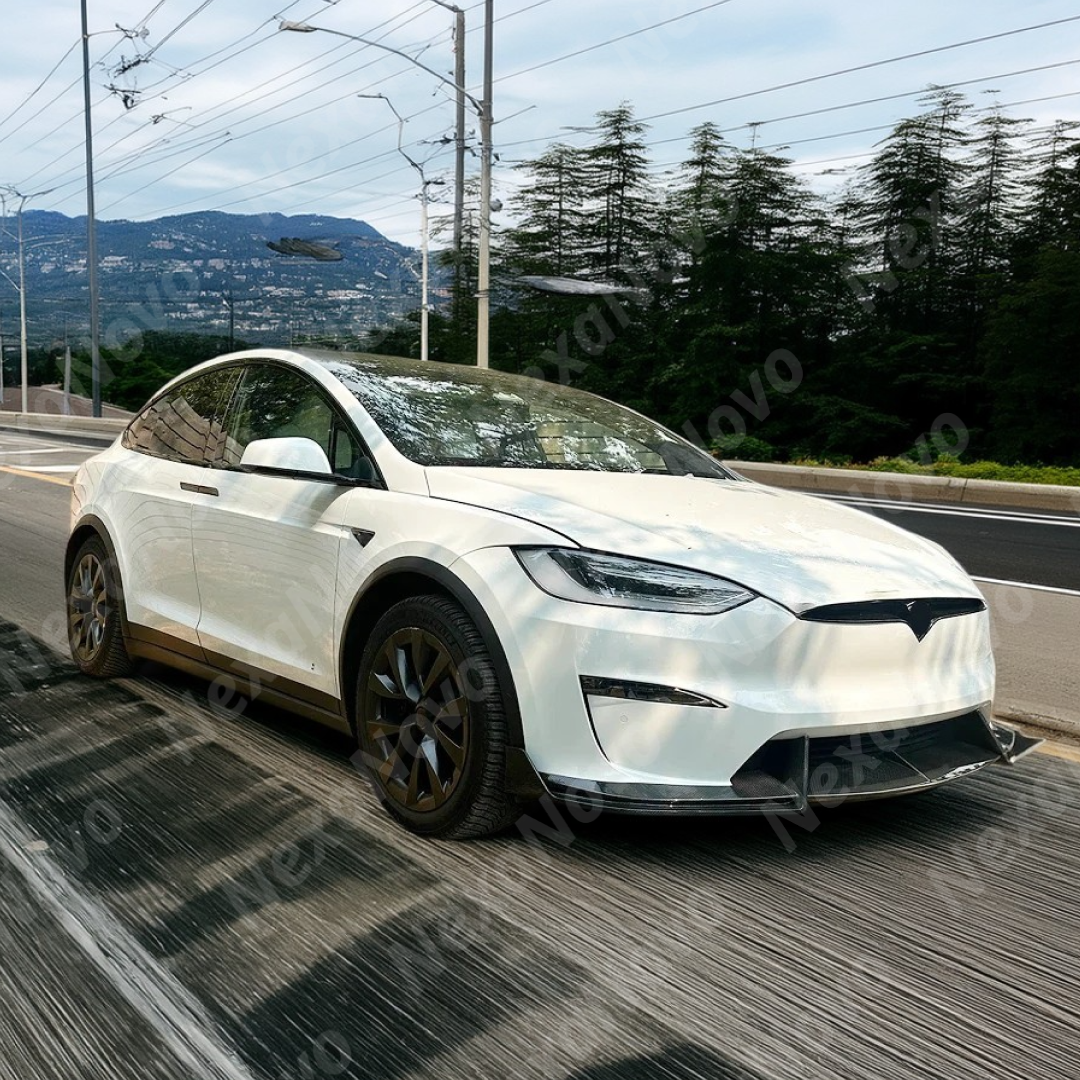 NexaNovo real carbon fiber front splitter on a white Tesla Model X