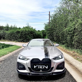 Dynamic shot of a BMW G22 G23 with its new NaxaNovo VTEN front lip.