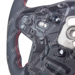 Direct front view showcasing the D-cut flat-bottom racing contour and red 12 o'clock center marker in the Supra cabin