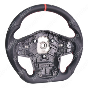 Driver seat view highlighting the motorsport-inspired steering wheel profile and digital gauge cluster