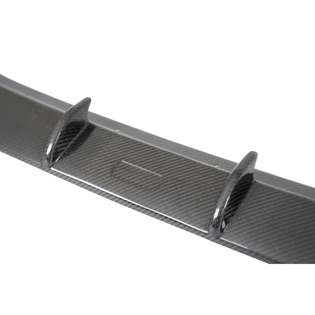 Front-end shot emphasizing the widened, muscular stance of the GR86 with NexaNovo carbon aero