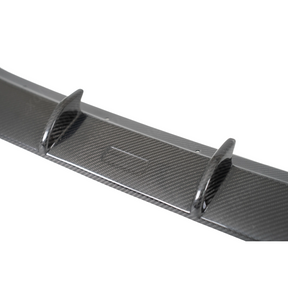 Front-end shot emphasizing the widened, muscular stance of the GR86 with NexaNovo carbon aero