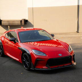 Direct front-facing view of the NexaNovo authentic carbon fiber front lip for 2022-2025 Toyota GR86