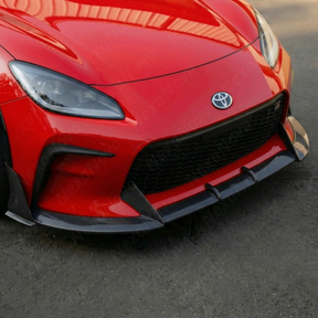 Aggressive high-performance look of the NexaNovo real carbon fiber splitter on a Track bRed Toyota GR86