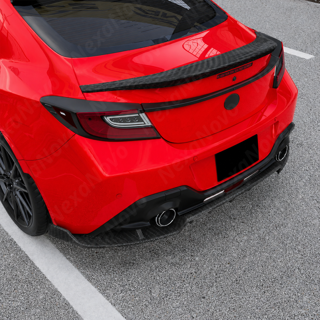 Aggressive carbon print GT-style rear diffuser kit installed on a 2023 Subaru BRZ.