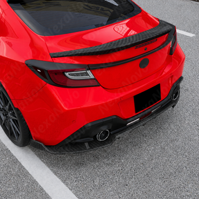 Aggressive carbon print GT-style rear diffuser kit installed on a 2023 Subaru BRZ.