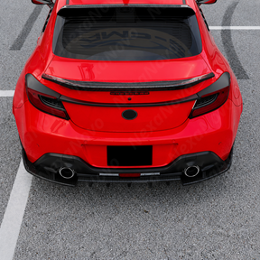 Back perspective highlighting the aerodynamic upward-swept profile of the carbon print GT-style diffuser.