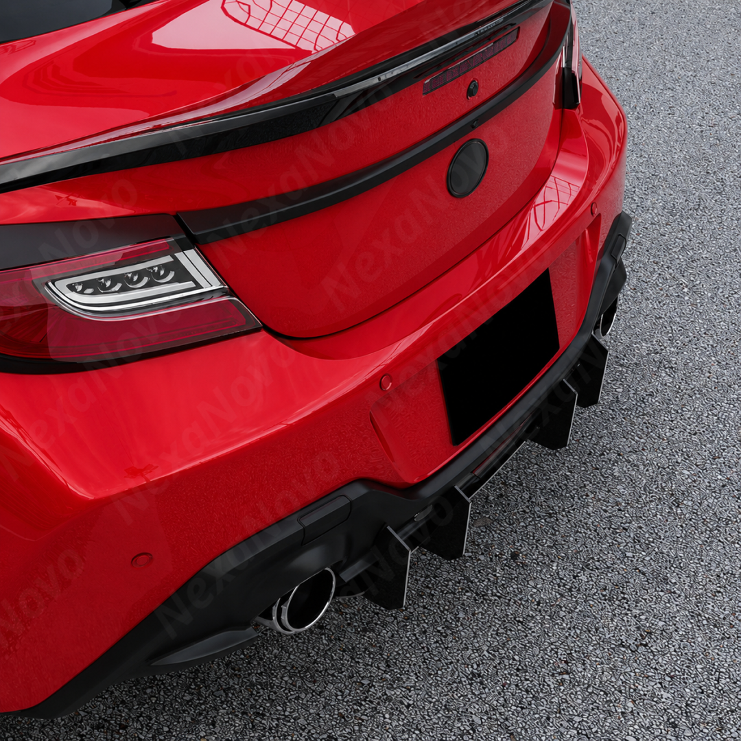 Showing the ample clearance around the factory quad-tip exhaust with the gloss black diffuser installed.