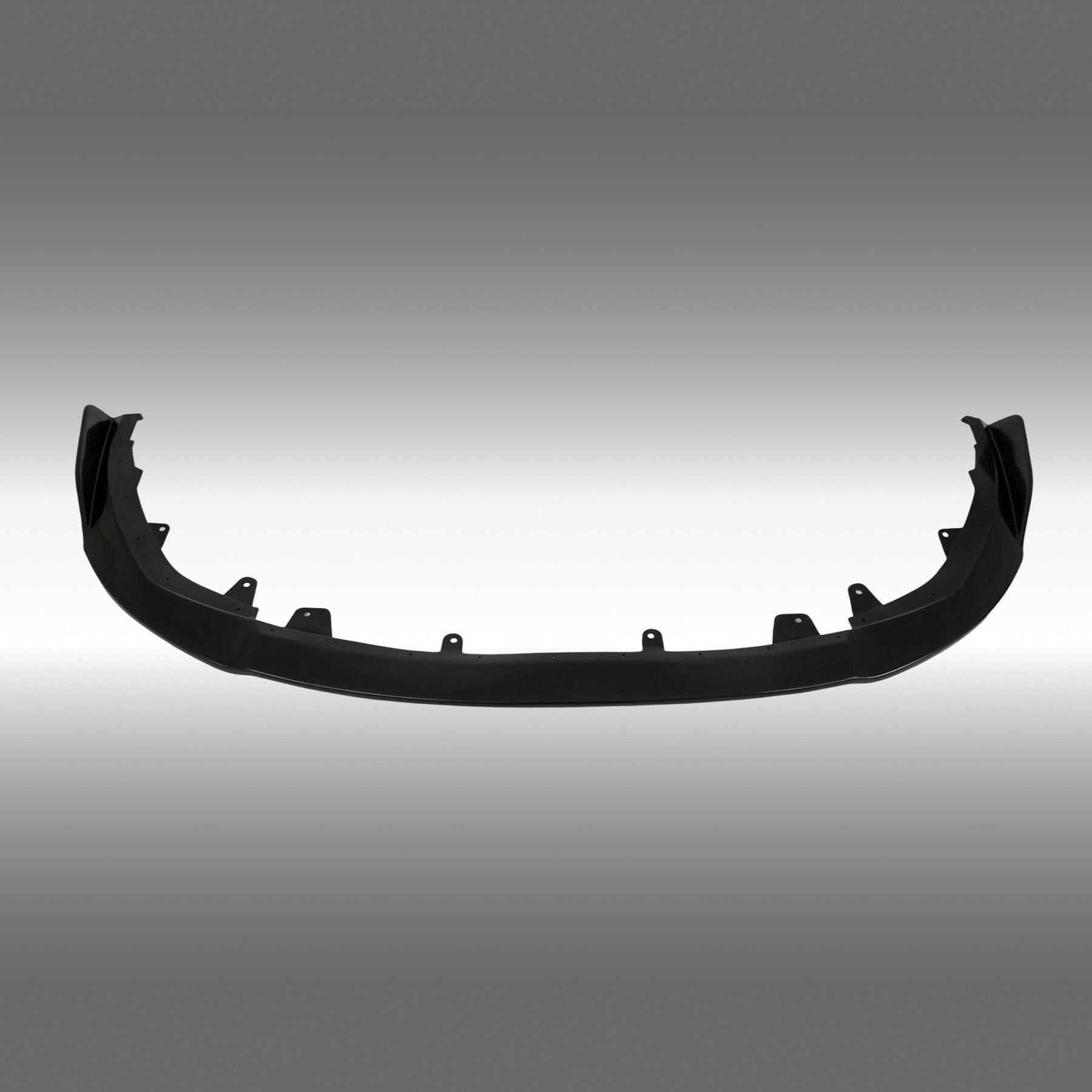 Direct front-facing view of the NexaNovo gloss black front lip for 2023-2026 Toyota Prius