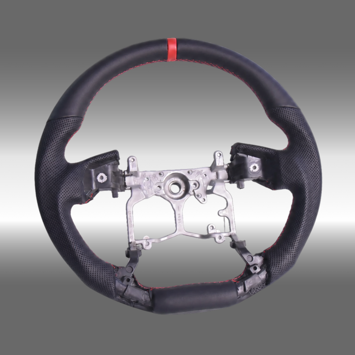 TRD style custom black leather steering wheel with top red center stripe installed in a Toyota 4Runner cabin