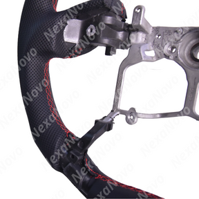 Performance-inspired TRD steering wheel installed in a Toyota Tundra cabin