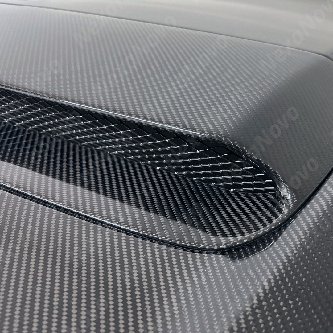 Close-up view of the Real Carbon Fiber Front Engine Hood on the Subaru WRX 2022-2024 model, emphasizing the lightweight and durable construction