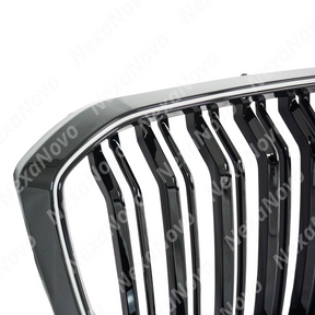 Low angle view emphasizing the NexaNovo glossy black LED grills on X5 G05