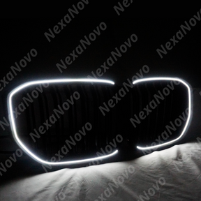 NexaNovo LED glossy black grills on a white BMW X5 G05