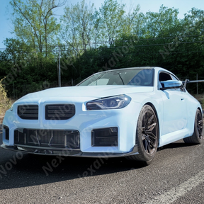 Full front view of a BMW G87 M2 with NexaNovo carbon fiber front lip