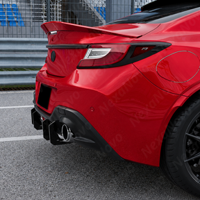 Low-angle ground shot highlighting the deep, aggressive profile of the V-style shark fins.