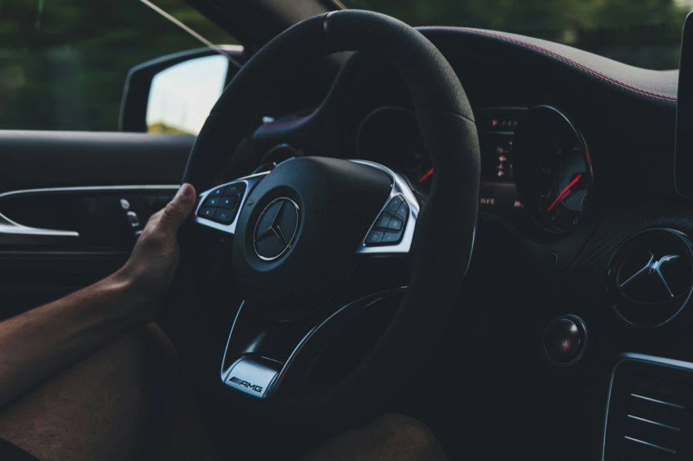 Alcantara steering wheel with center stripe in an AMG