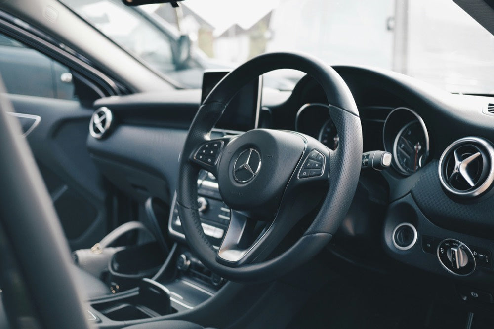 Perforated leather steering wheel in a Mercedes interior